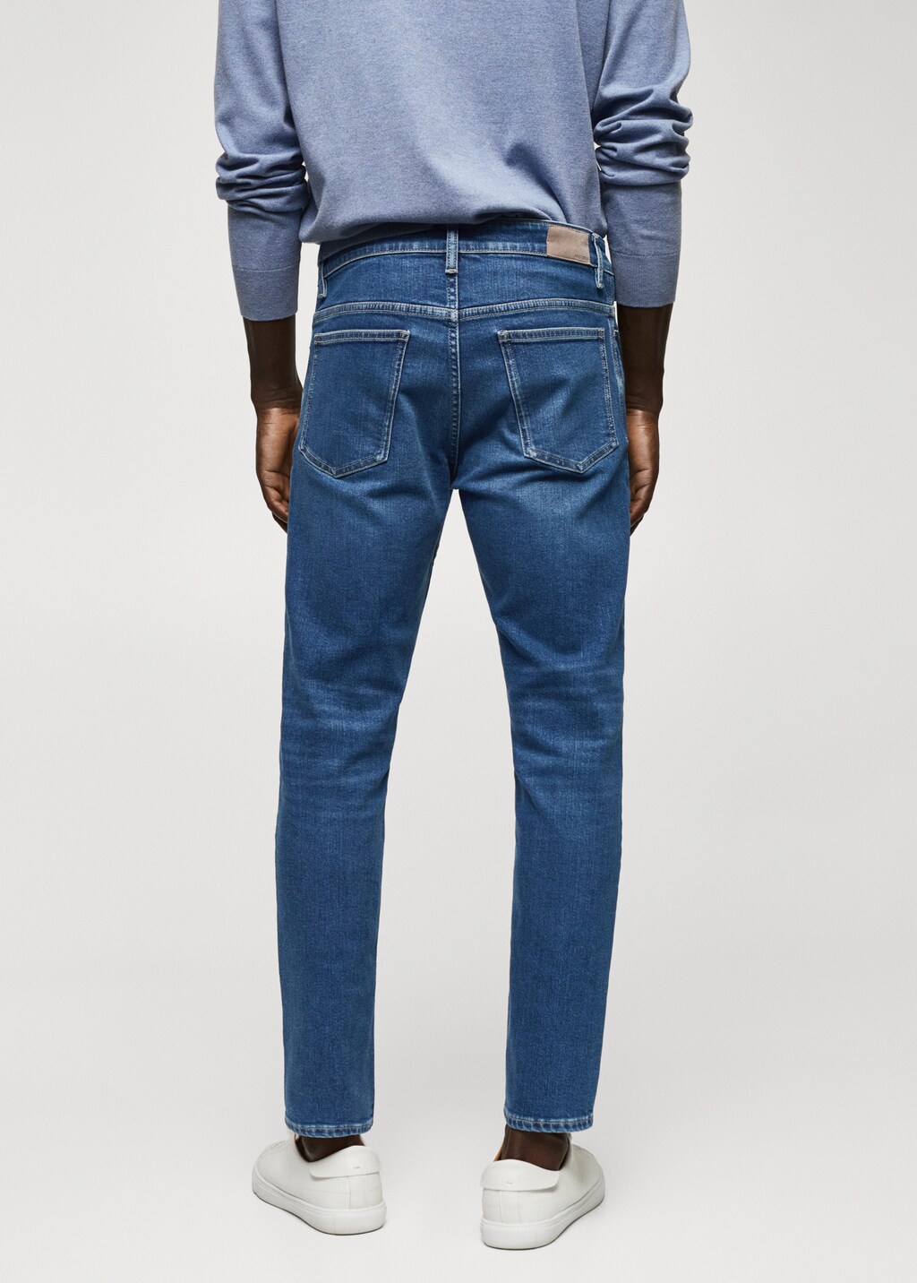 Tapered-Jeans Tom in Cropped-Länge - Rückseite des Artikels