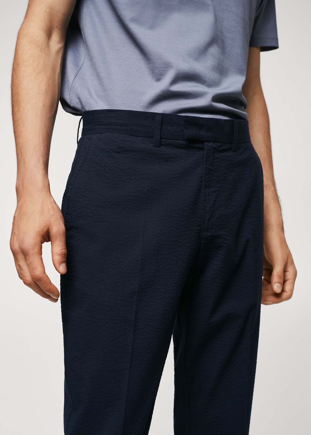 Slim-fit seersucker stretch trousers - Details of the article 1