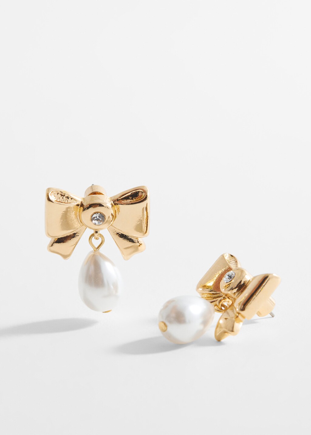 Pearl detail bow earrings - Medium plane