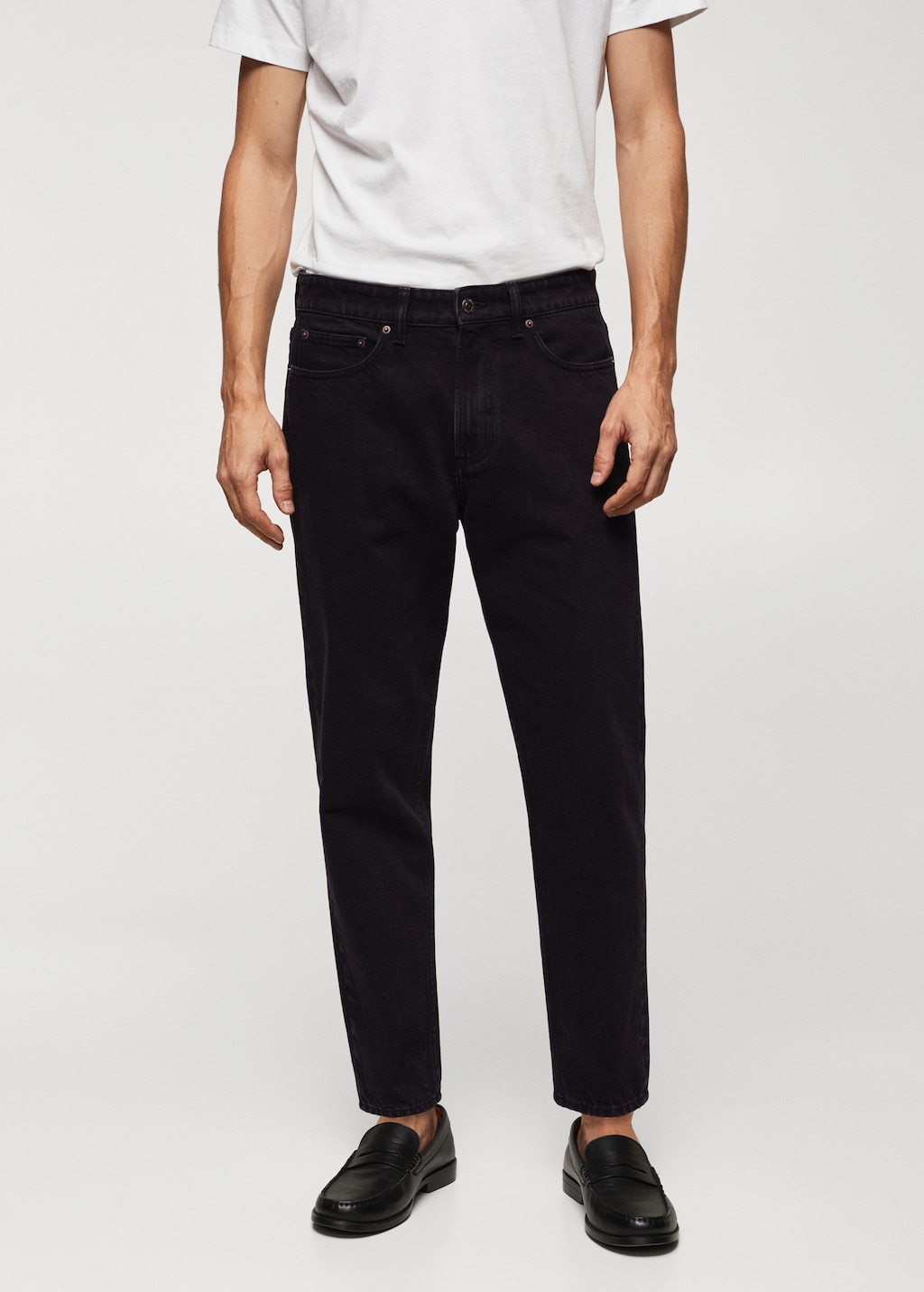 Jeans tapered fit - Bild av mittparti