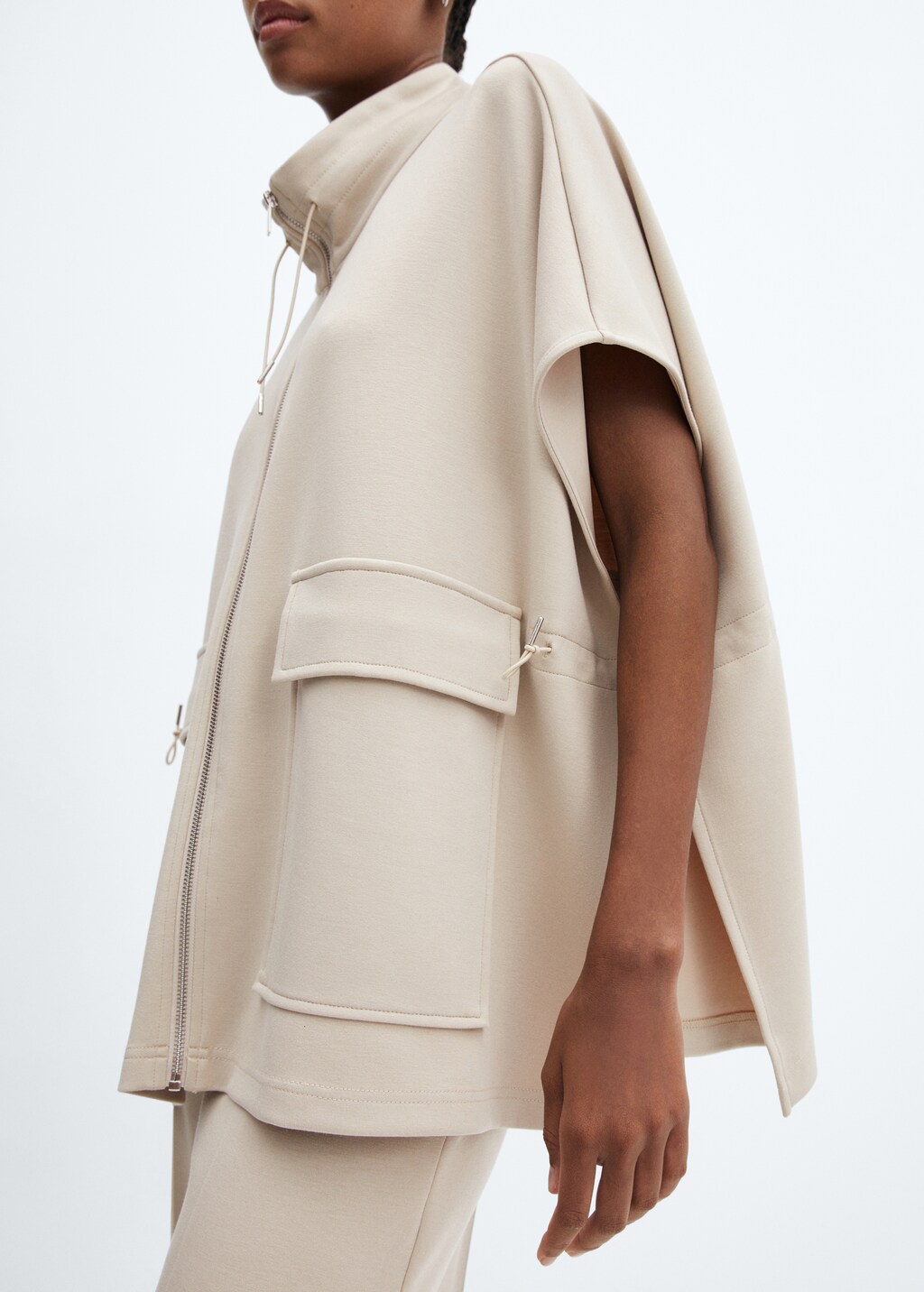 Poncho jacket with flap pockets  - Details of the article 6