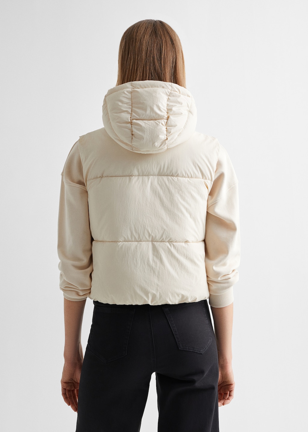 Quilted gilet with hood - Reverse of the article