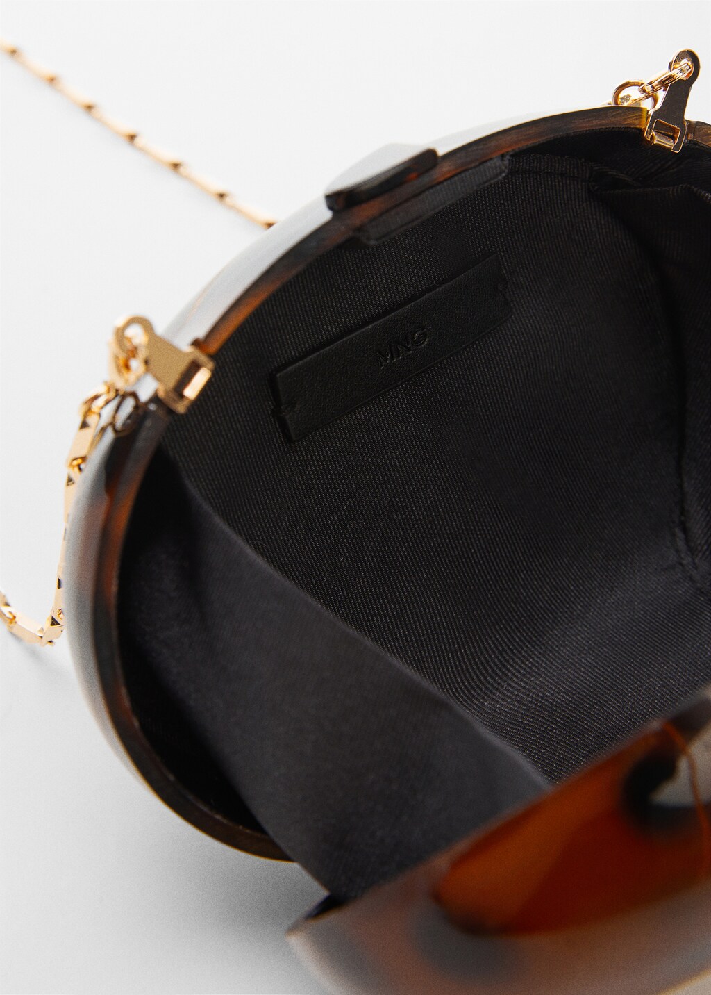 Onbuigzame clutch met ketting - Detail van het artikel 2