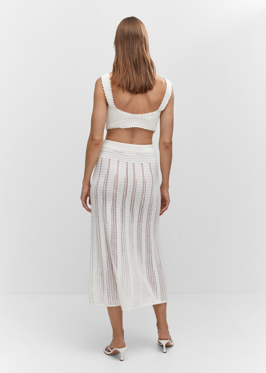 Knitted skirt with openwork details - Reverse of the article