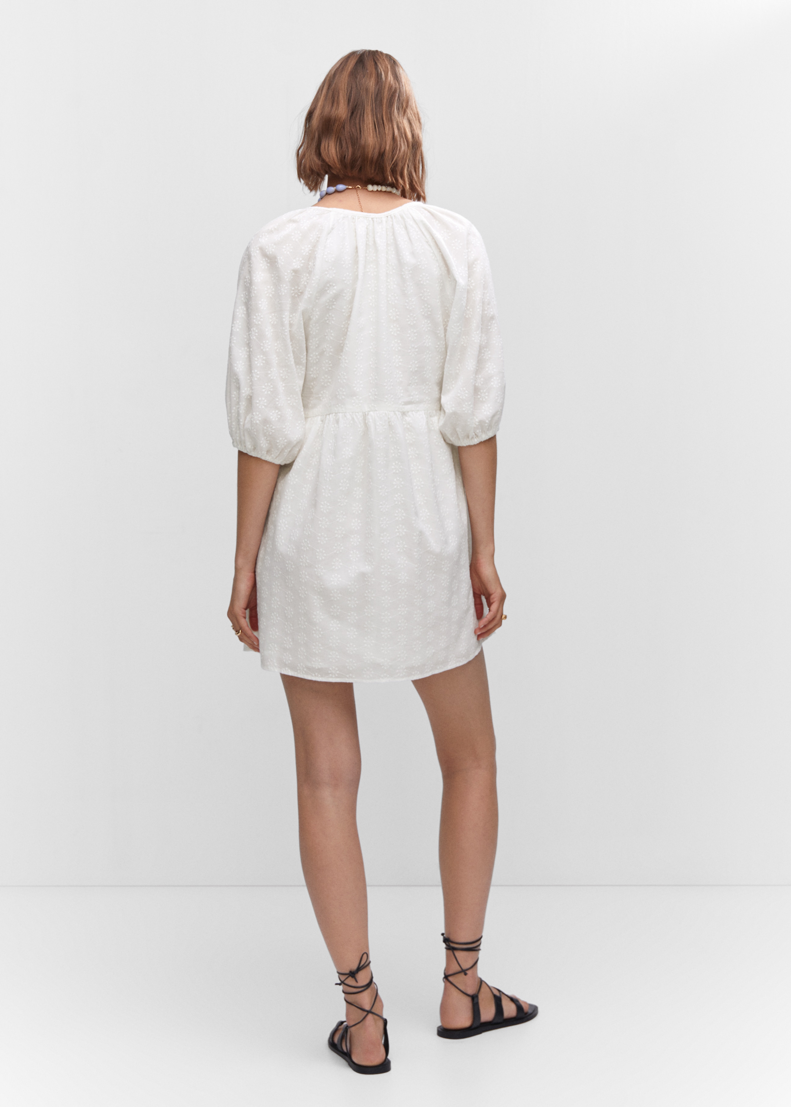 Puff-sleeved embroidered dress - Reverse of the article
