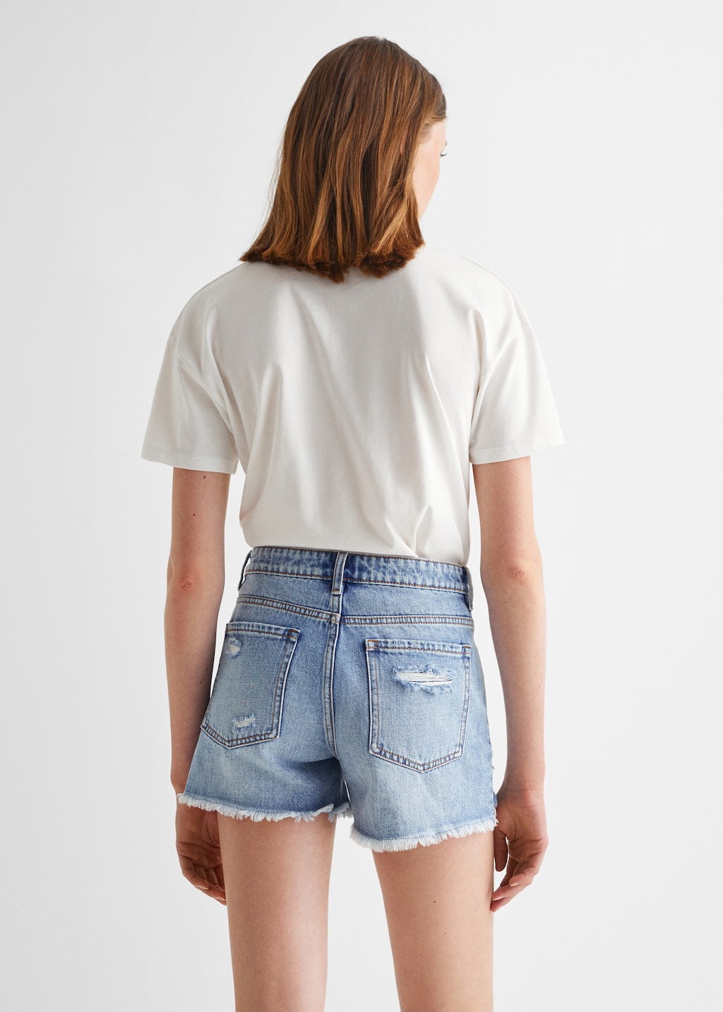 Denim shorts met scheuren - Achterkant van het artikel