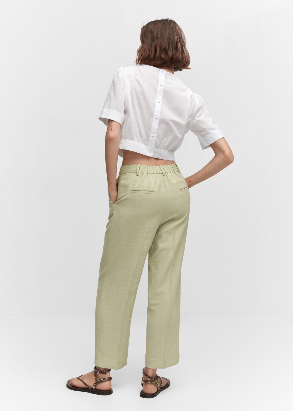 Pleated straight <b>trousers</b> - Reverse of the article.