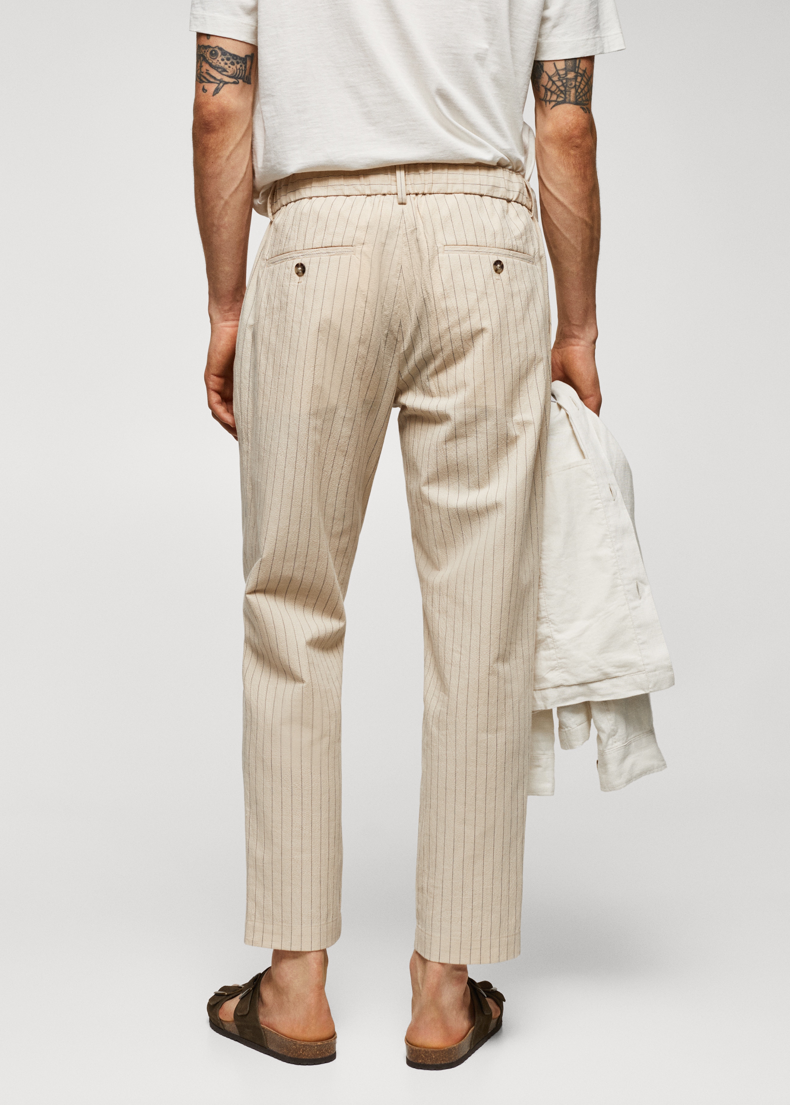 Cotton-linen seersucker trousers - Reverse of the article