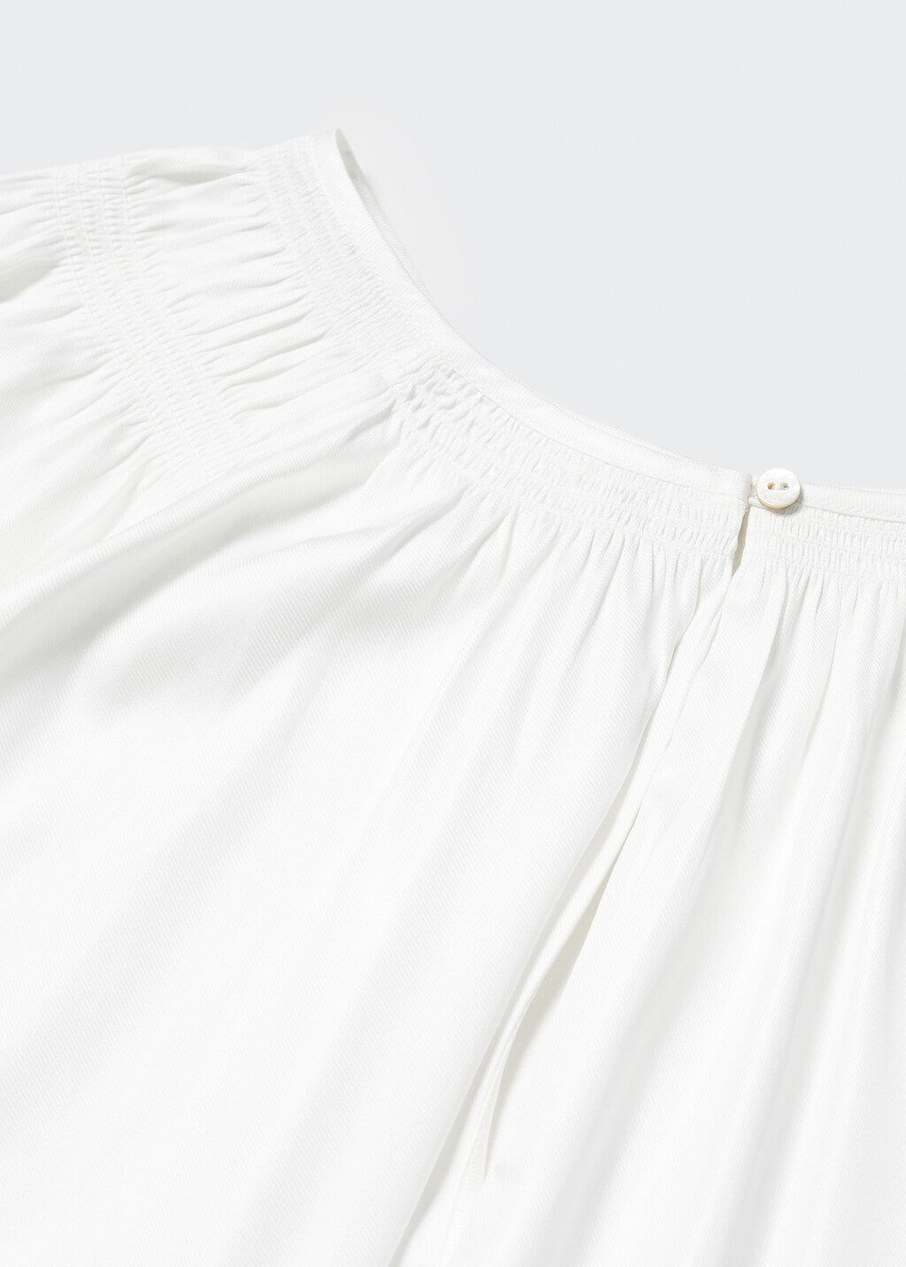 Pleated blouse with button - Details of the article 8