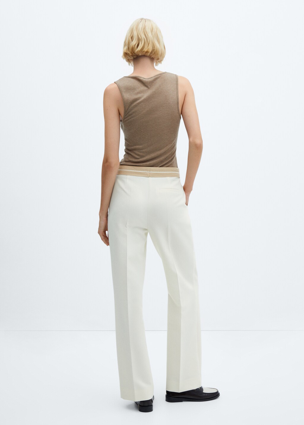 Pleated trousers with turn-up waist - Reverse of the article