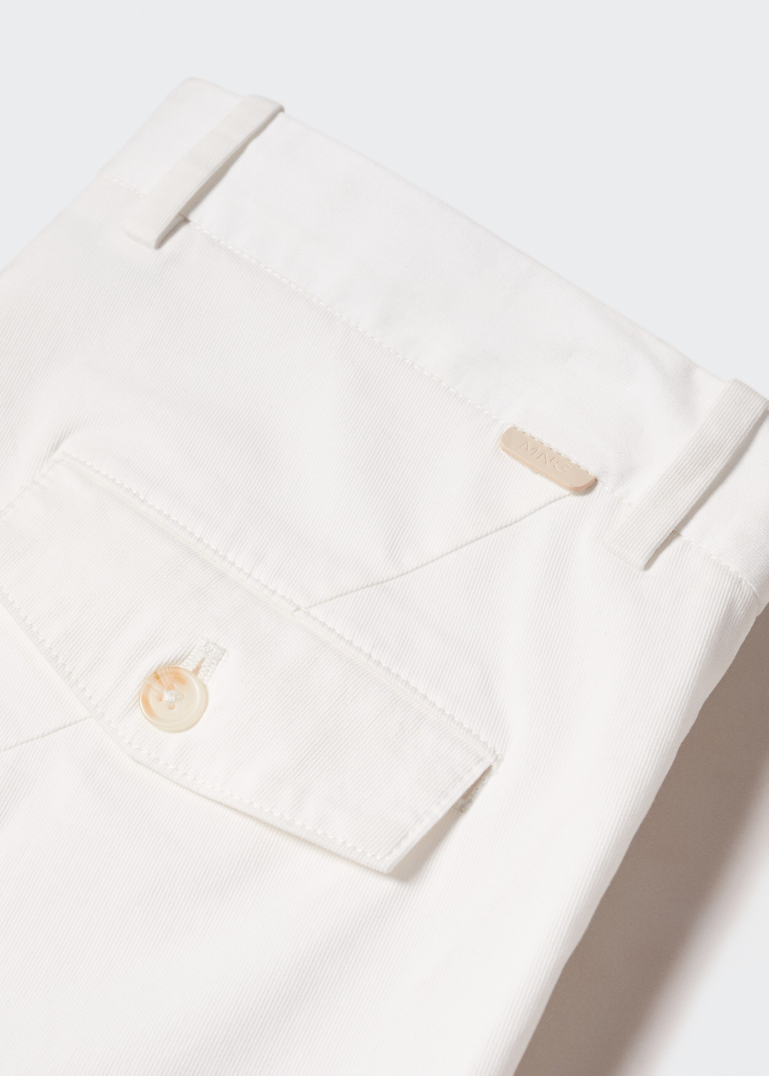 Slim-fit cotton pleated trousers - Details of the article 8