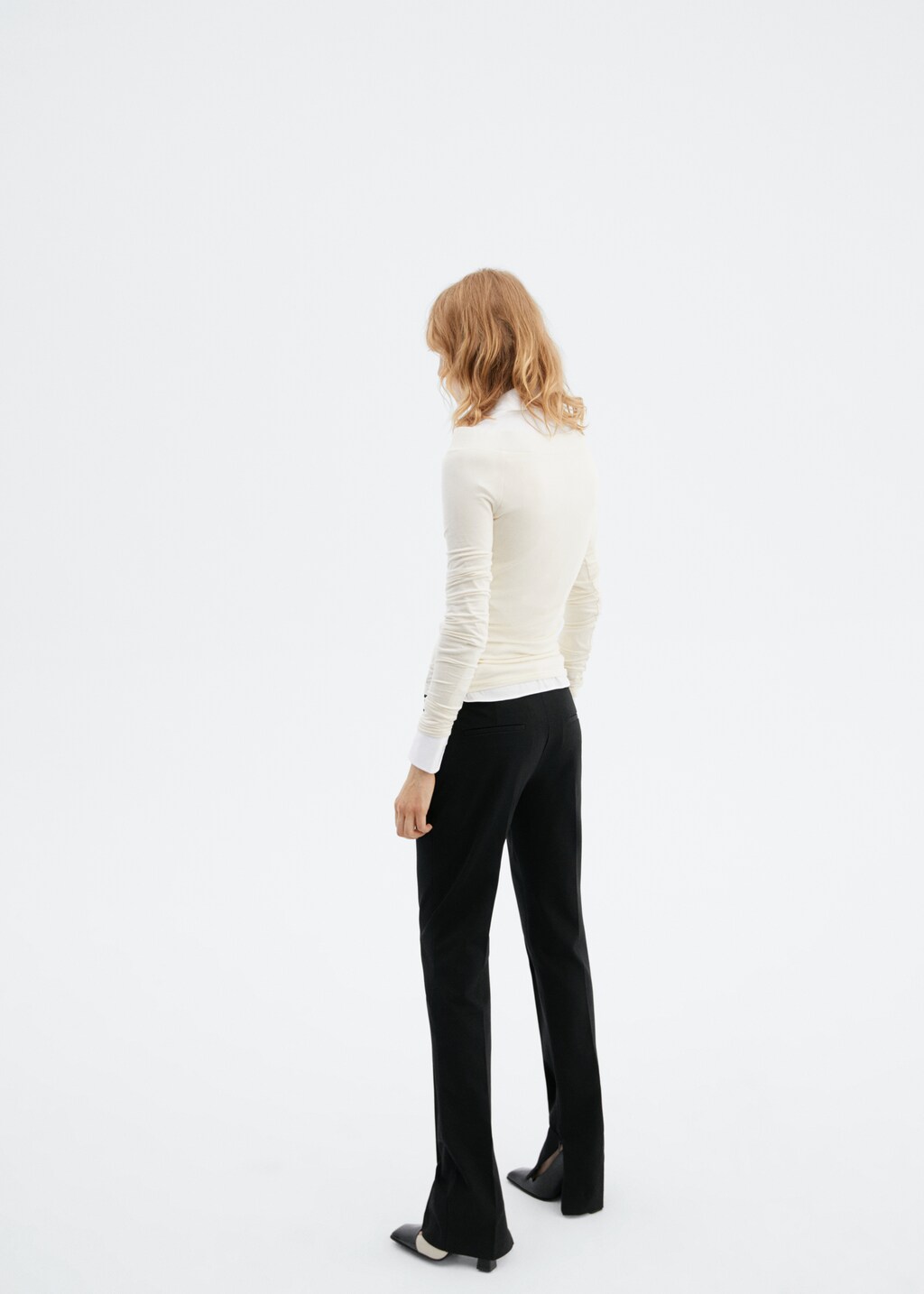 Zipped hem trousers - Reverse of the article