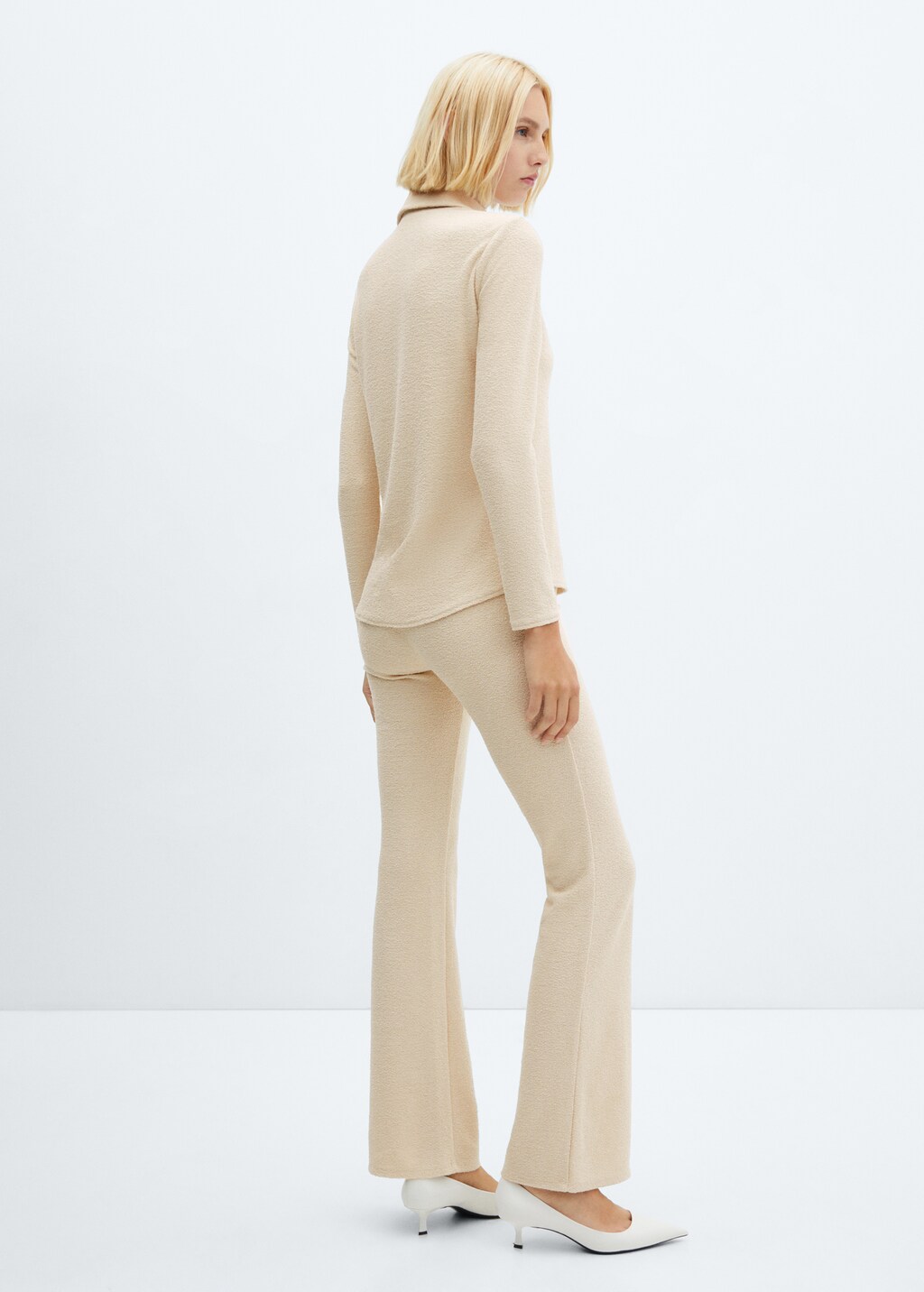 Flared knitted trousers - Reverse of the article