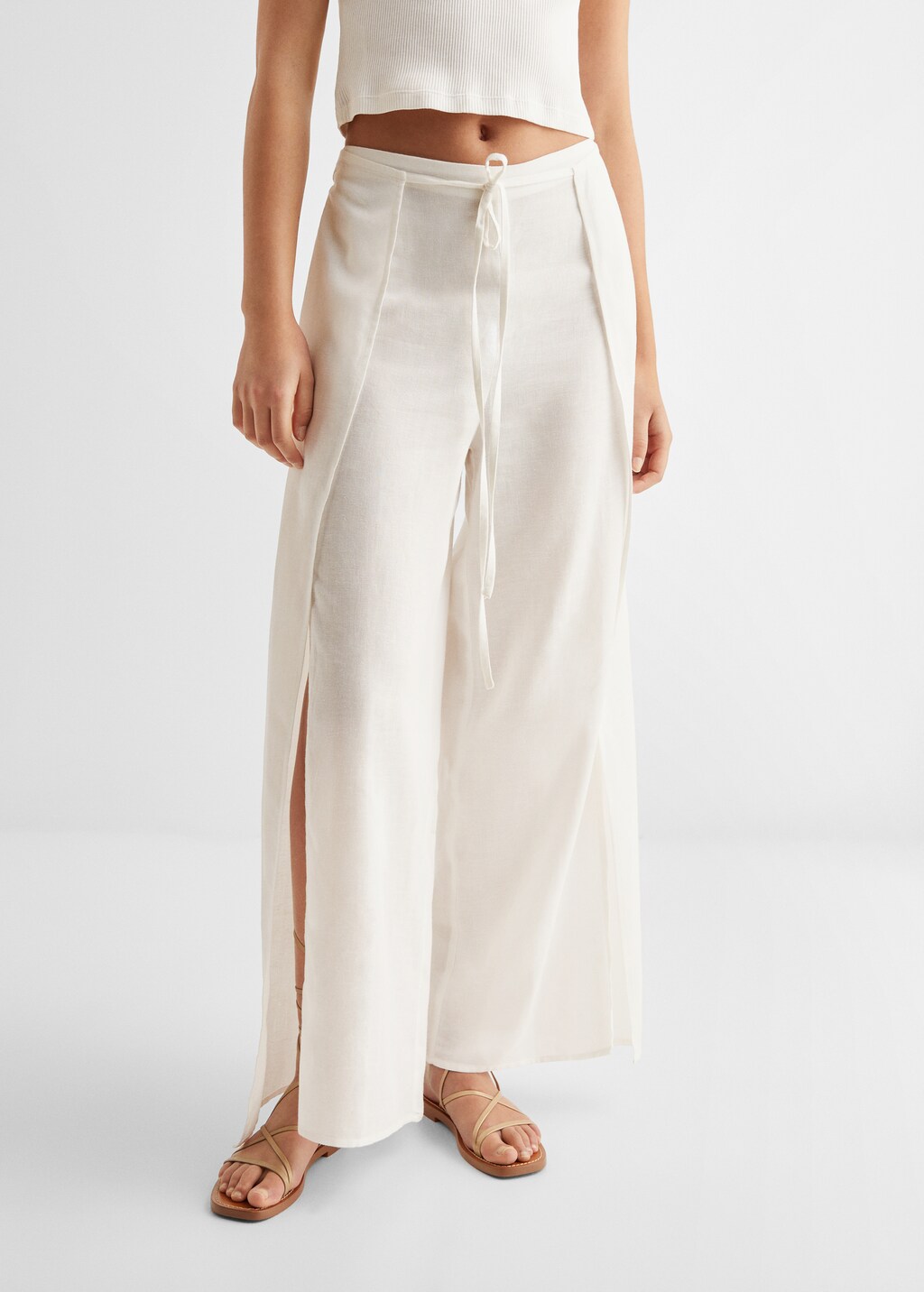 Side slit linen-blend trousers - Medium plane