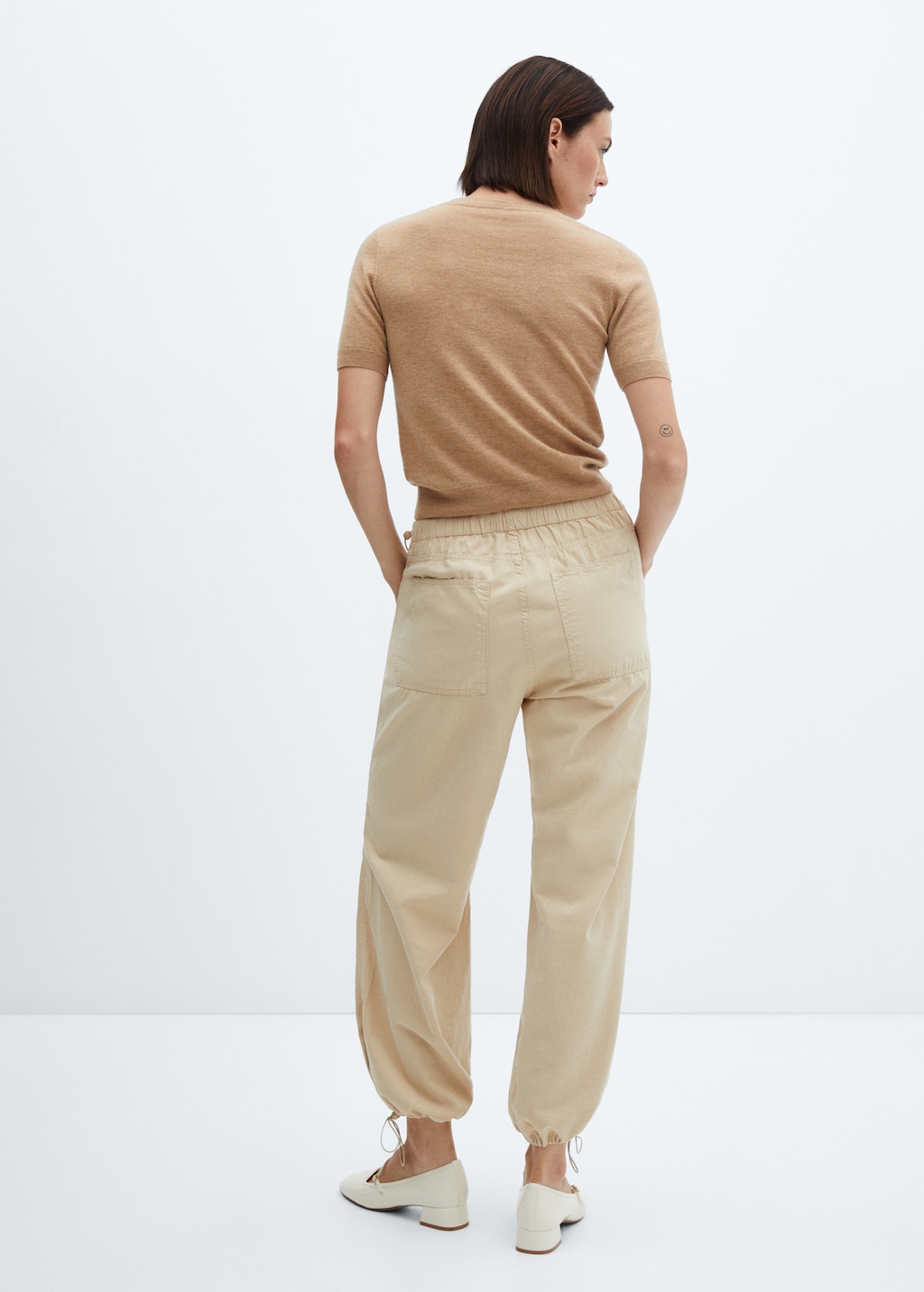 Parachute trousers - Reverse of the article