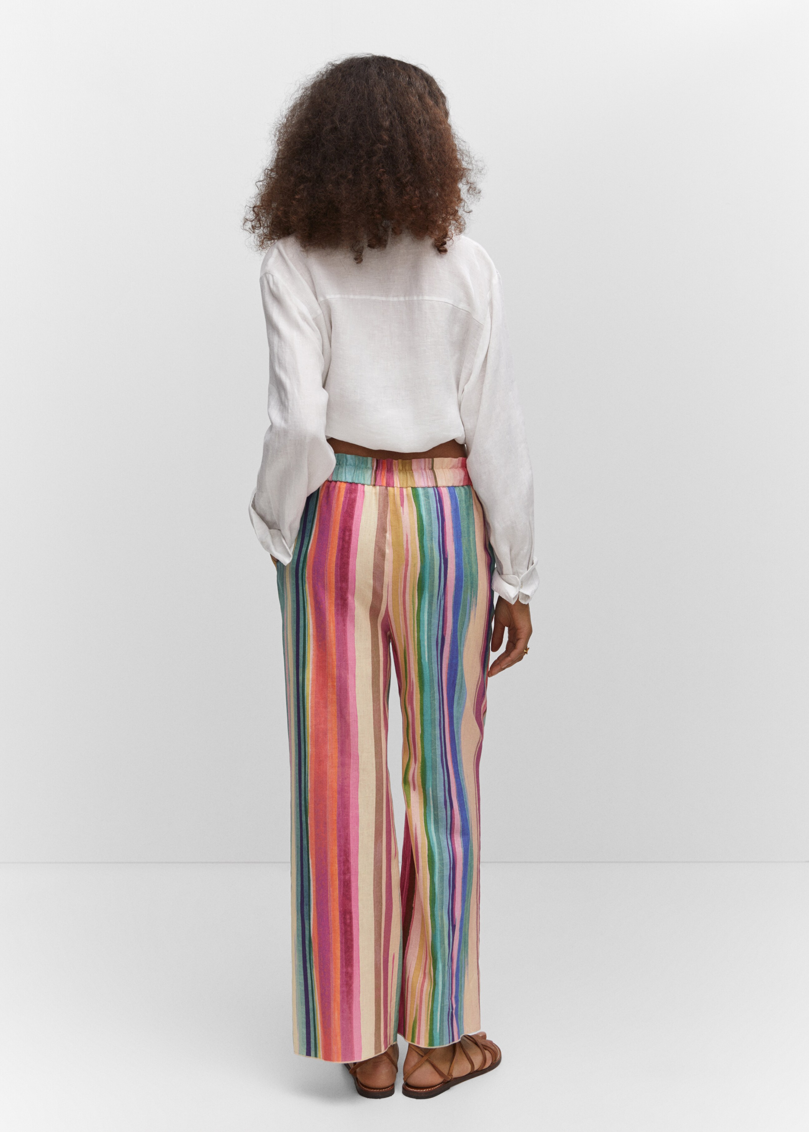 Multi-coloured striped linen trousers - Reverse of the article
