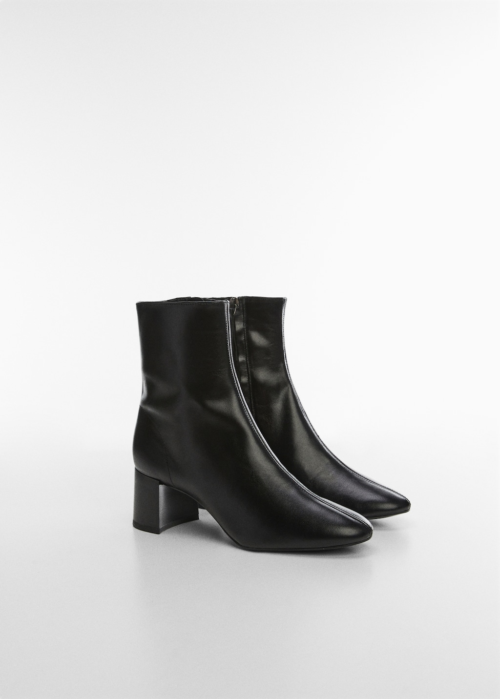 Heeled leather ankle boots - Medium plane