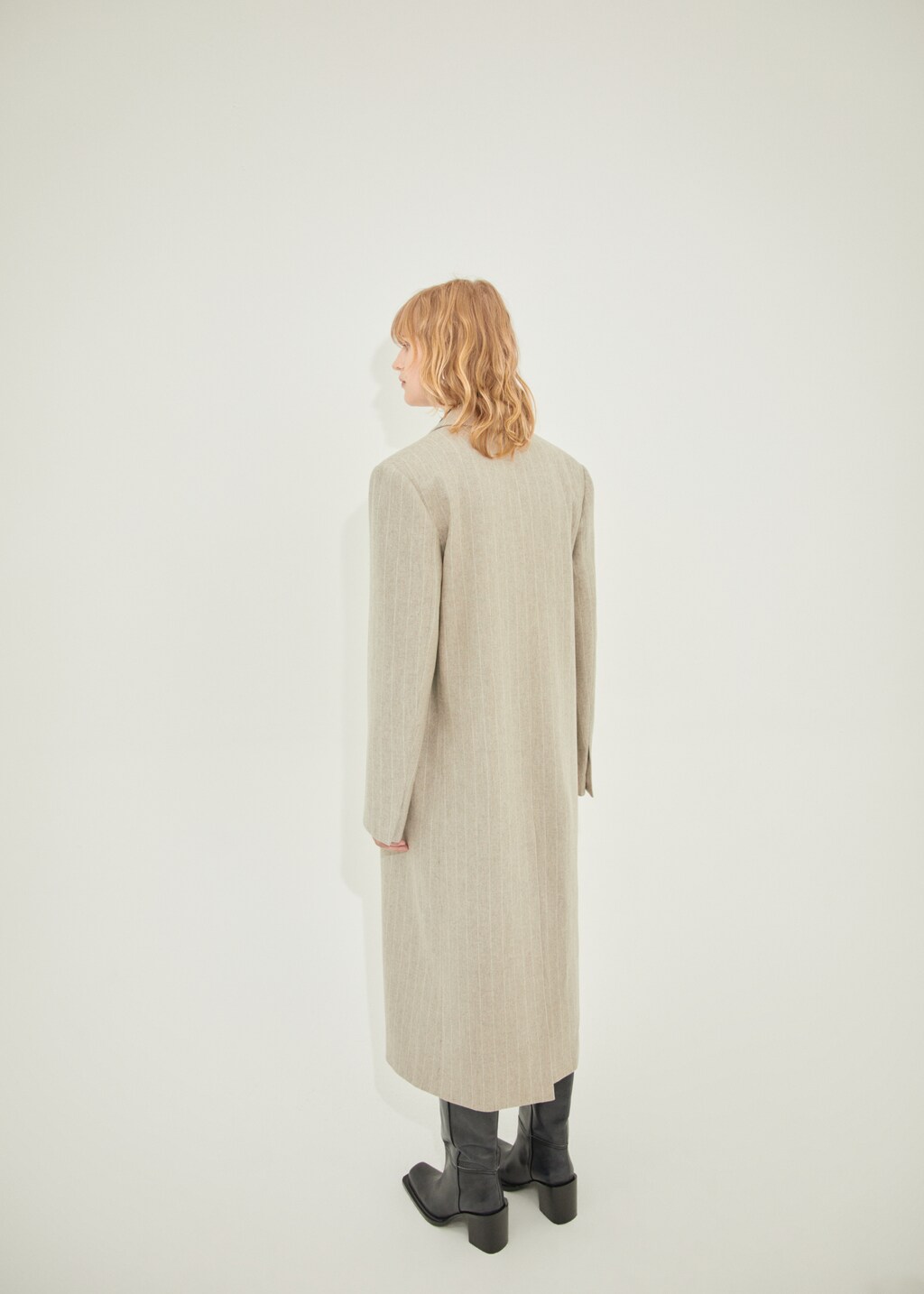 Pinstripe wool coat - Reverse of the article