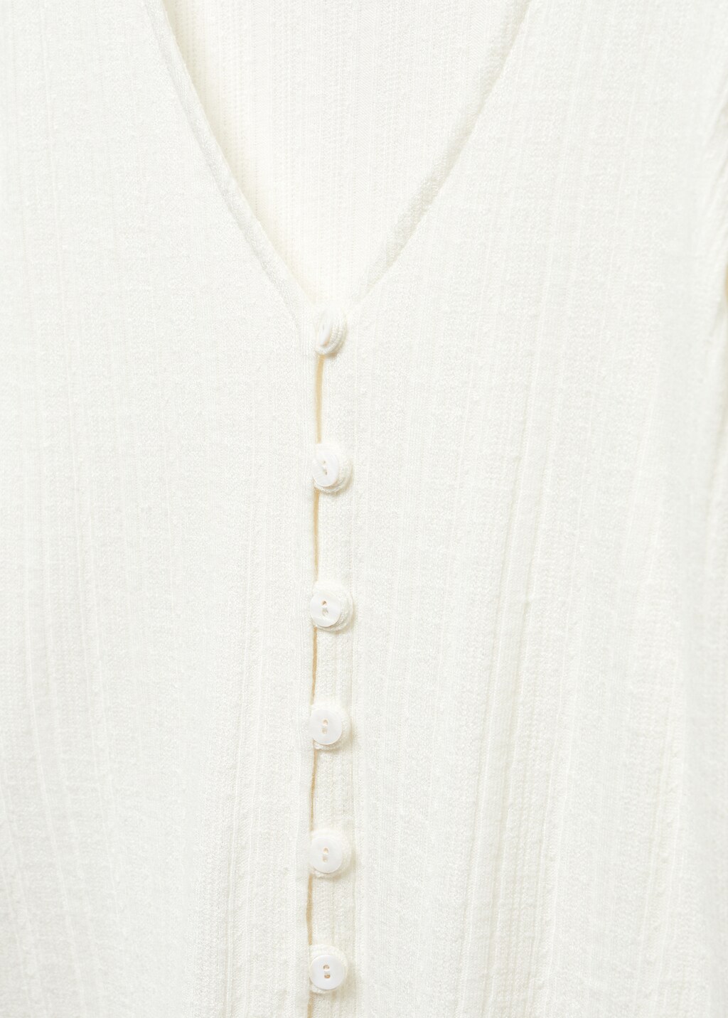 Knitted t-shirt with button - Details of the article 8