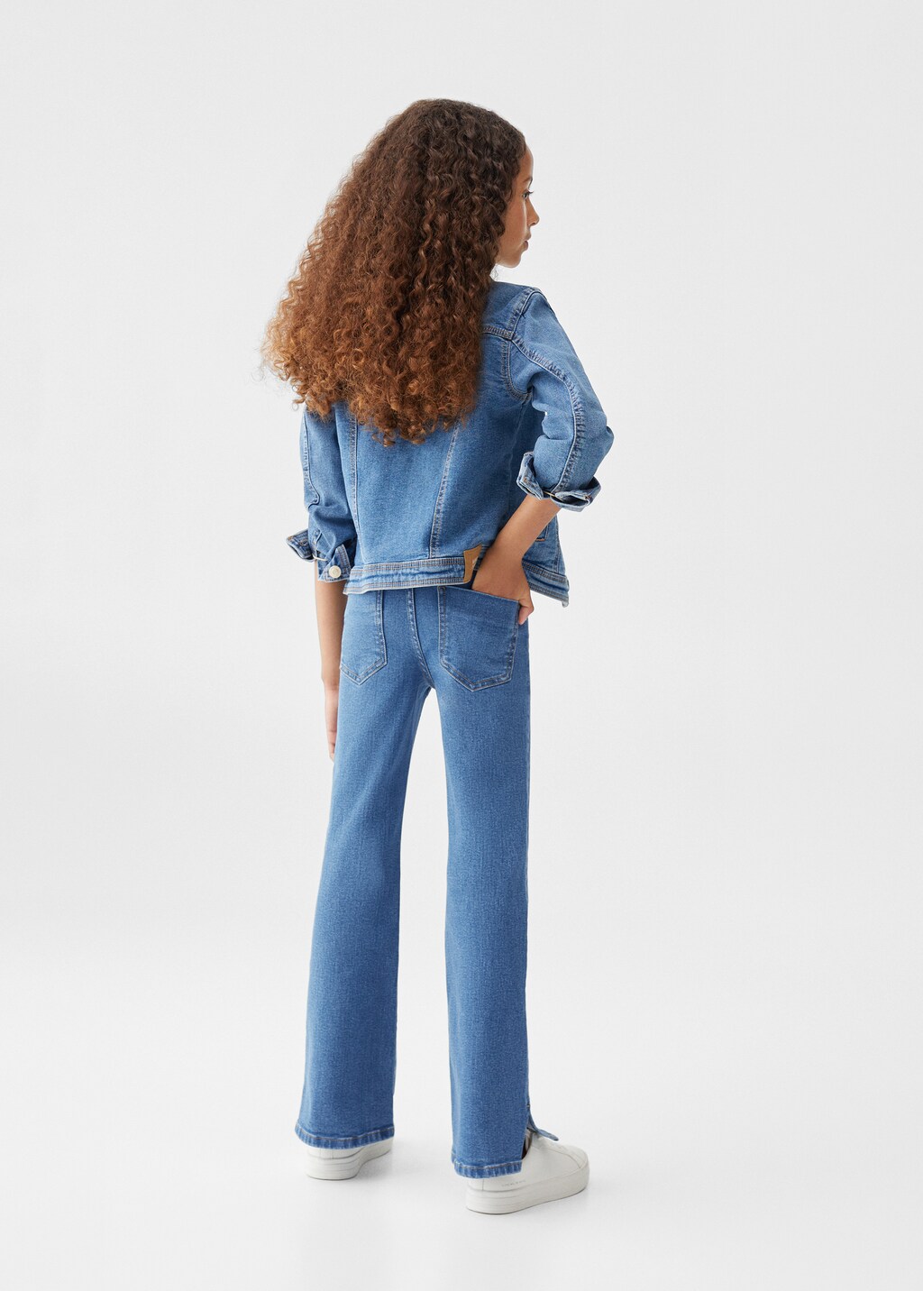 Flared jeans with slits - Reverse of the article