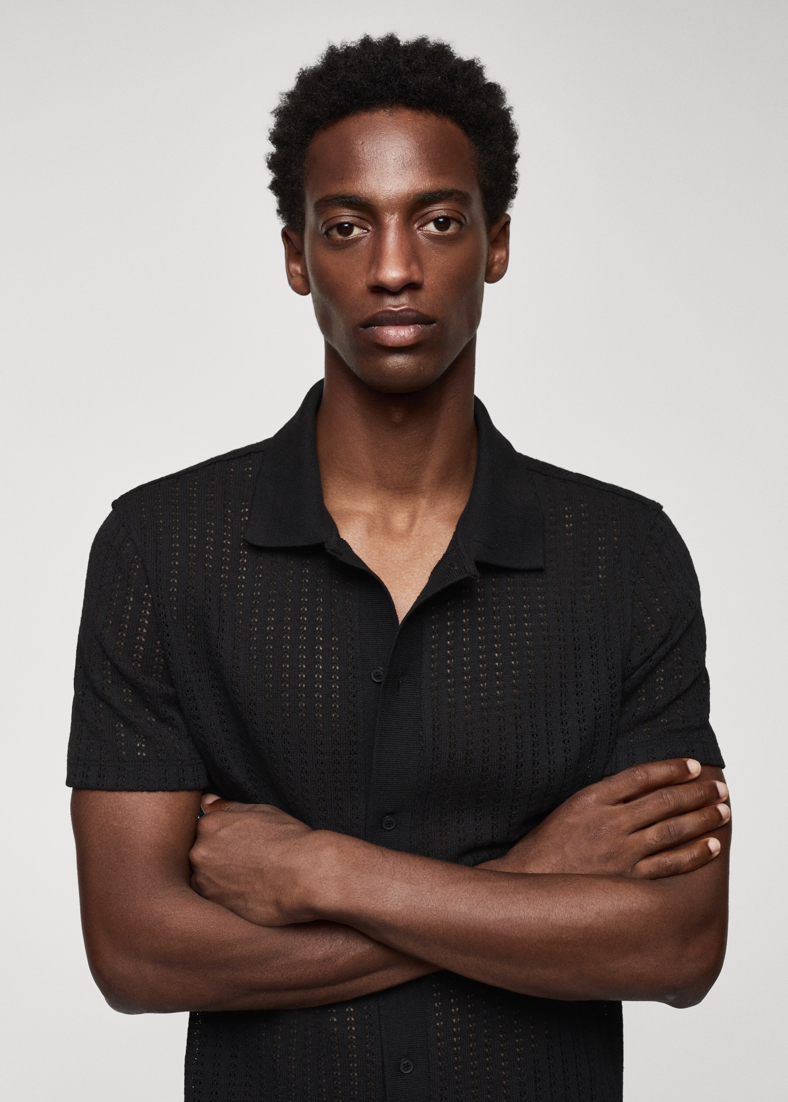 Cotton crochet polo shirt with buttons   - Details of the article 1