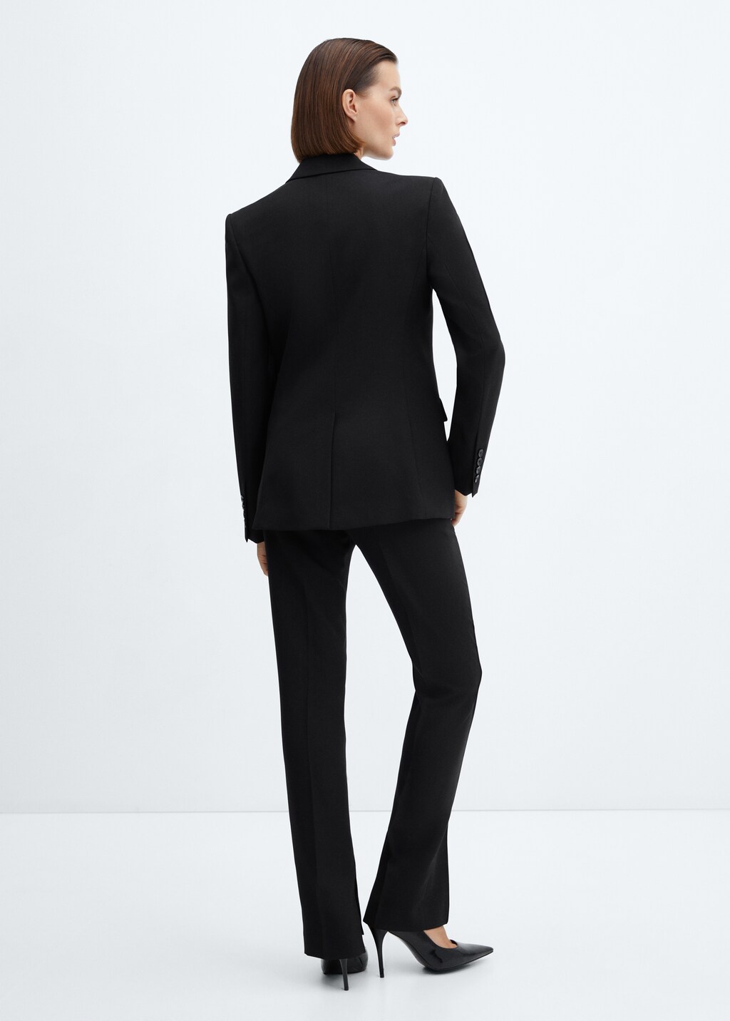 Side slit suit trousers - Reverse of the article