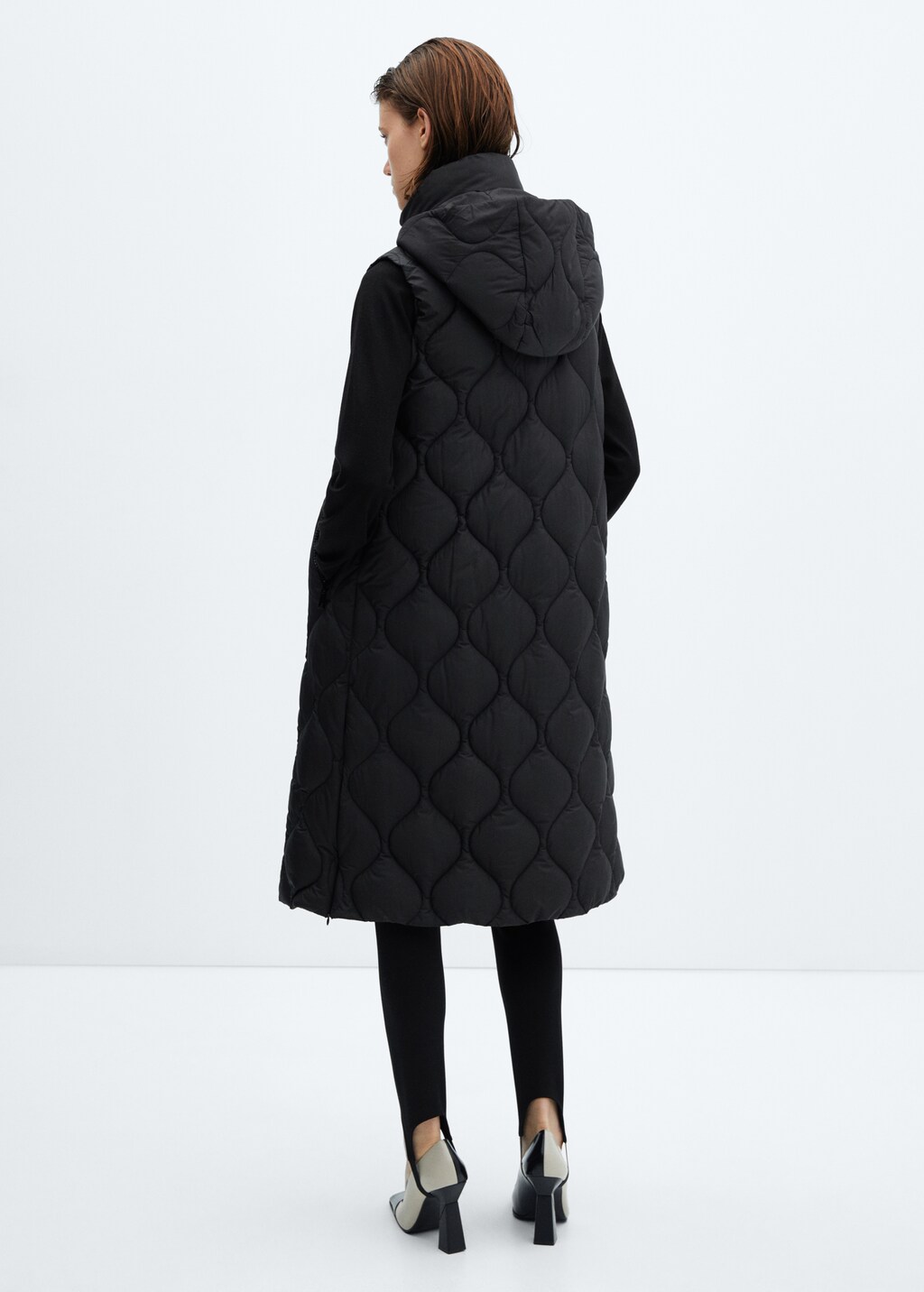 Long quilted gilet - Reverse of the article