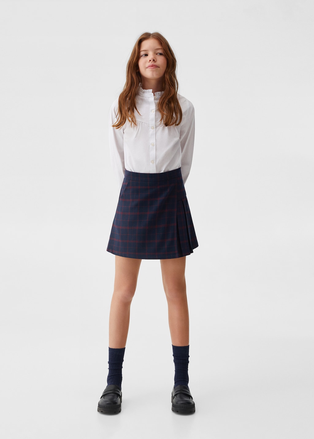 Pleated check skirt - General plane