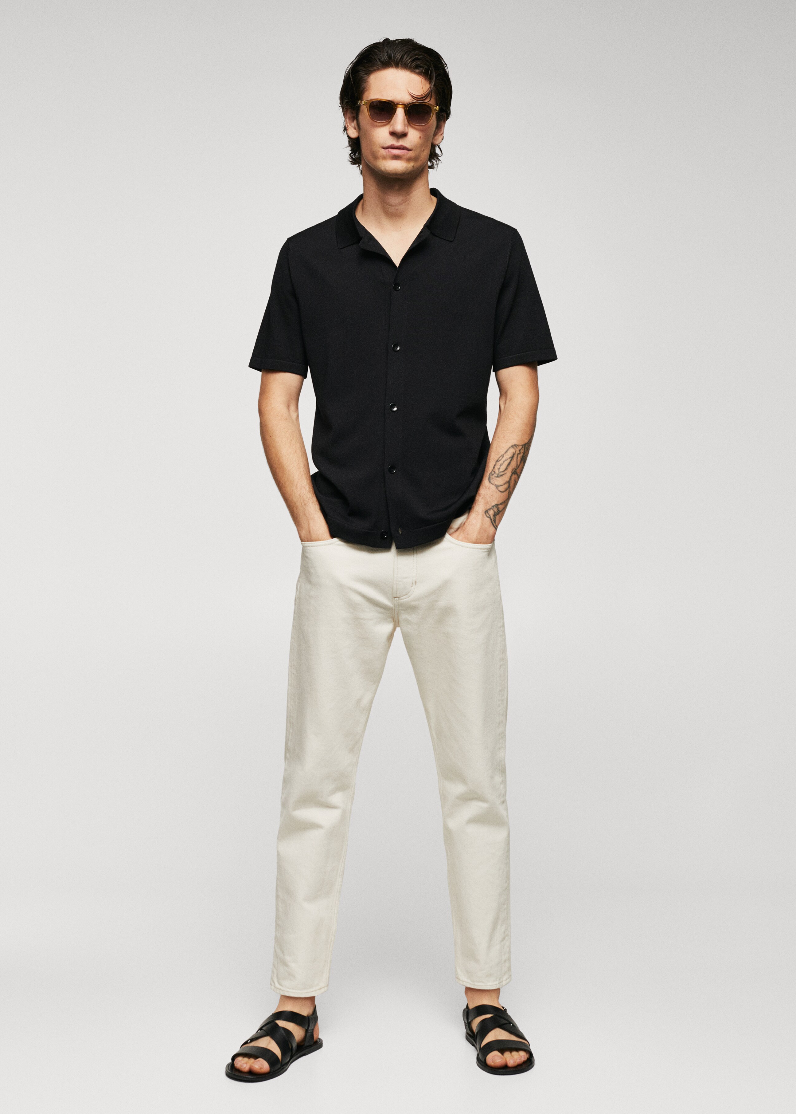 Buttoned micro-structure knitted polo shirt - General plane