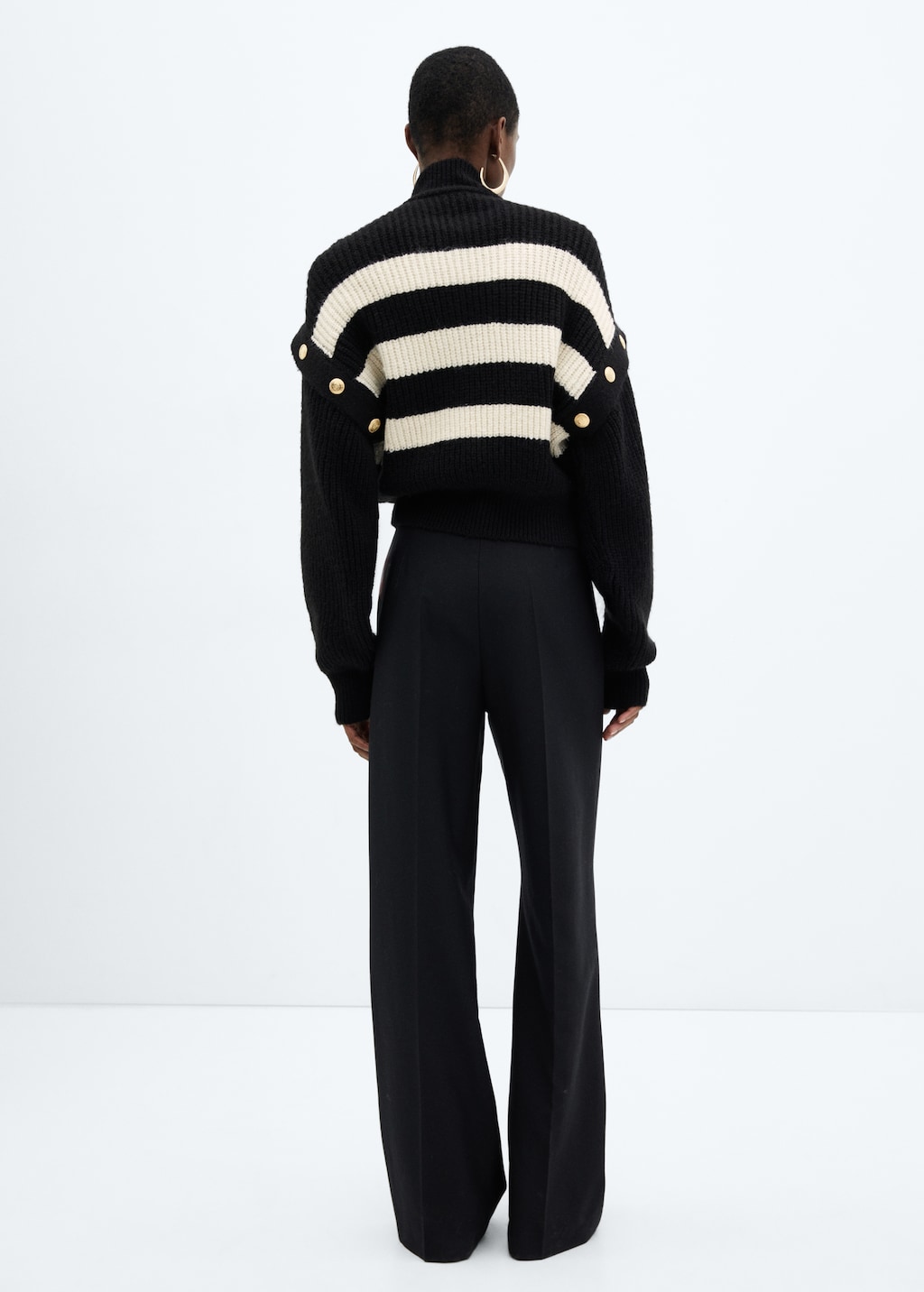 Buttoned striped sweater - Reverse of the article