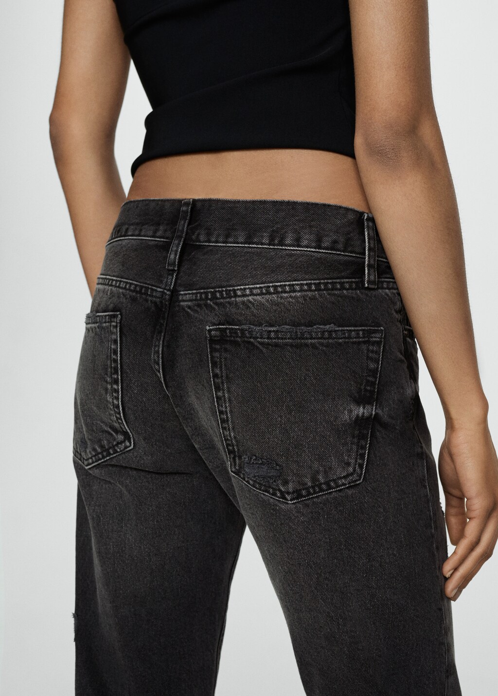 Ripped low-rise girlfriend jeans - Details of the article 1