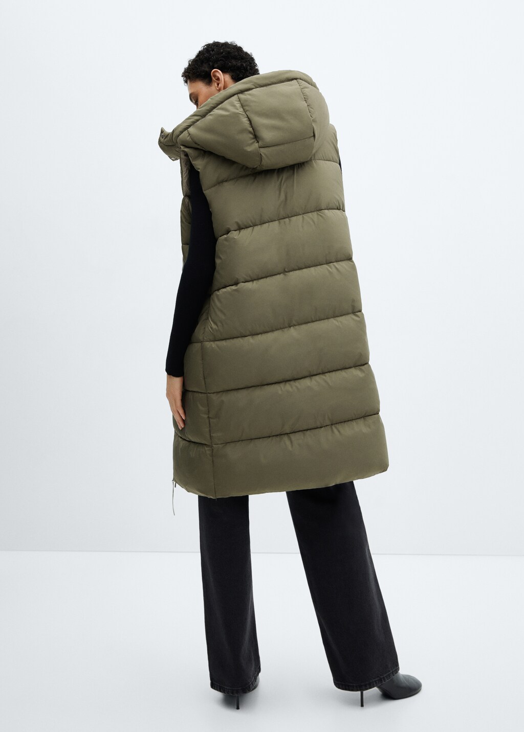 Quilted gilet with hood - Reverse of the article