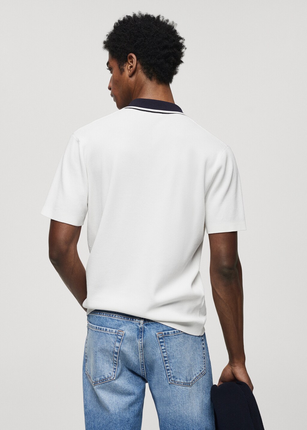 Contrasting neck knit polo shirt - Reverse of the article