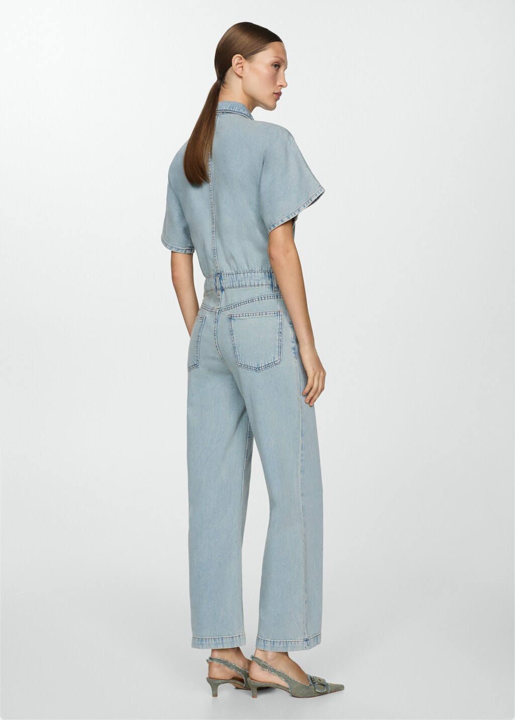 Denim jumpsuit with multi-position buttons - Reverse of the article