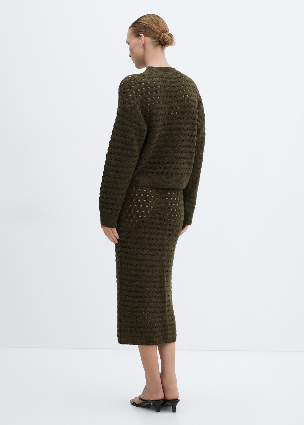 Knitted skirt with openwork details - Reverse of the article