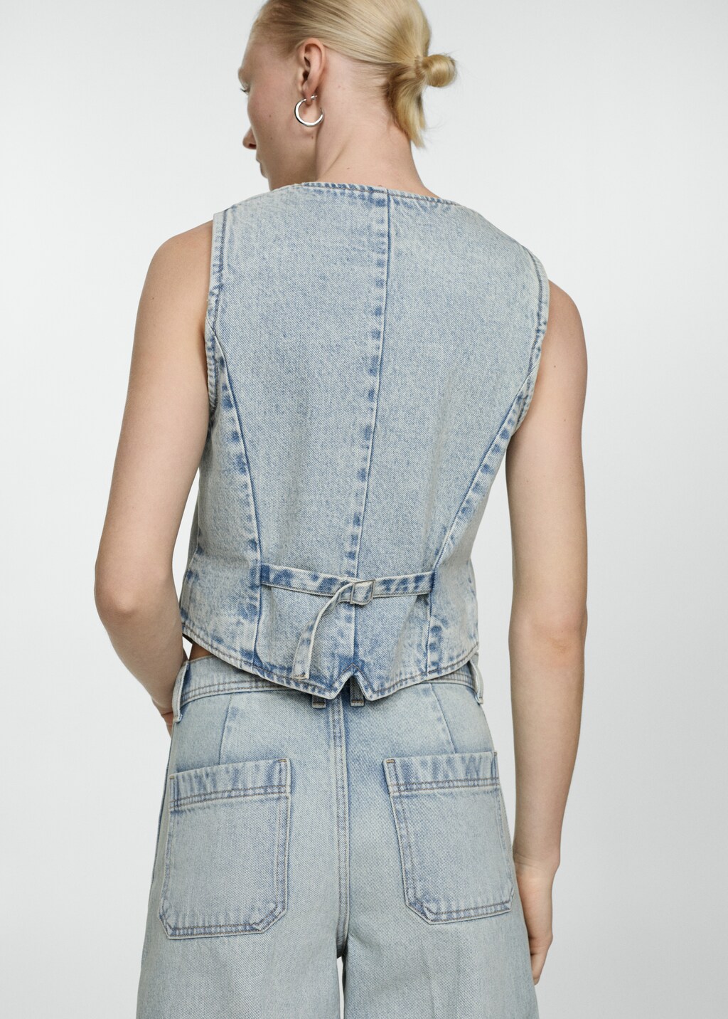 Denim gilet with seams - Reverse of the article