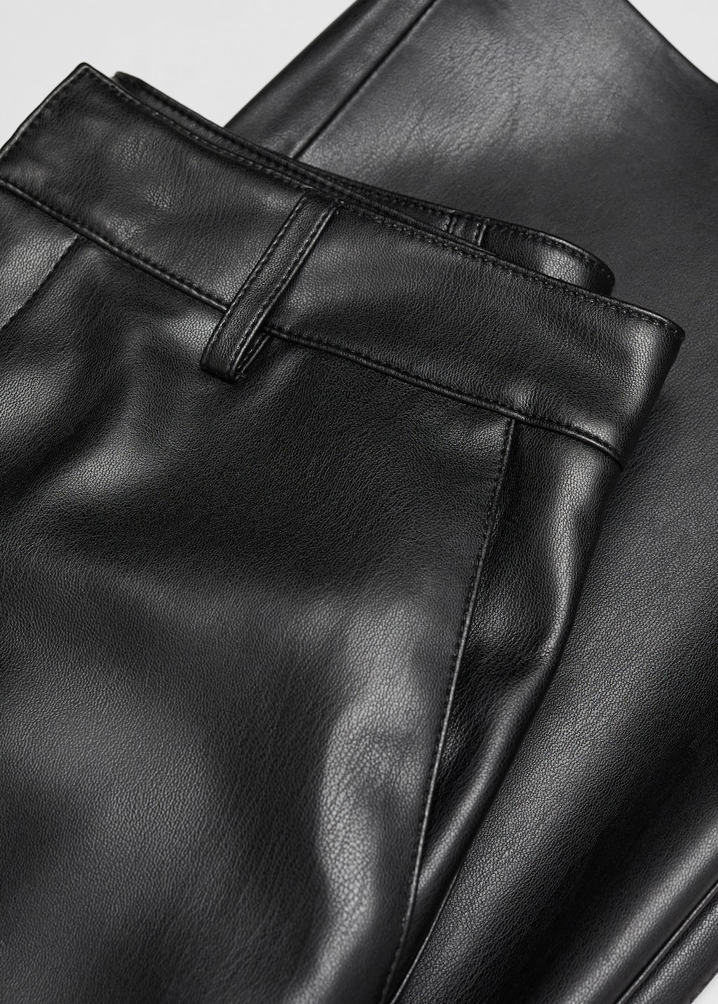 Leather-effect high-waist trousers - Details of the article 8