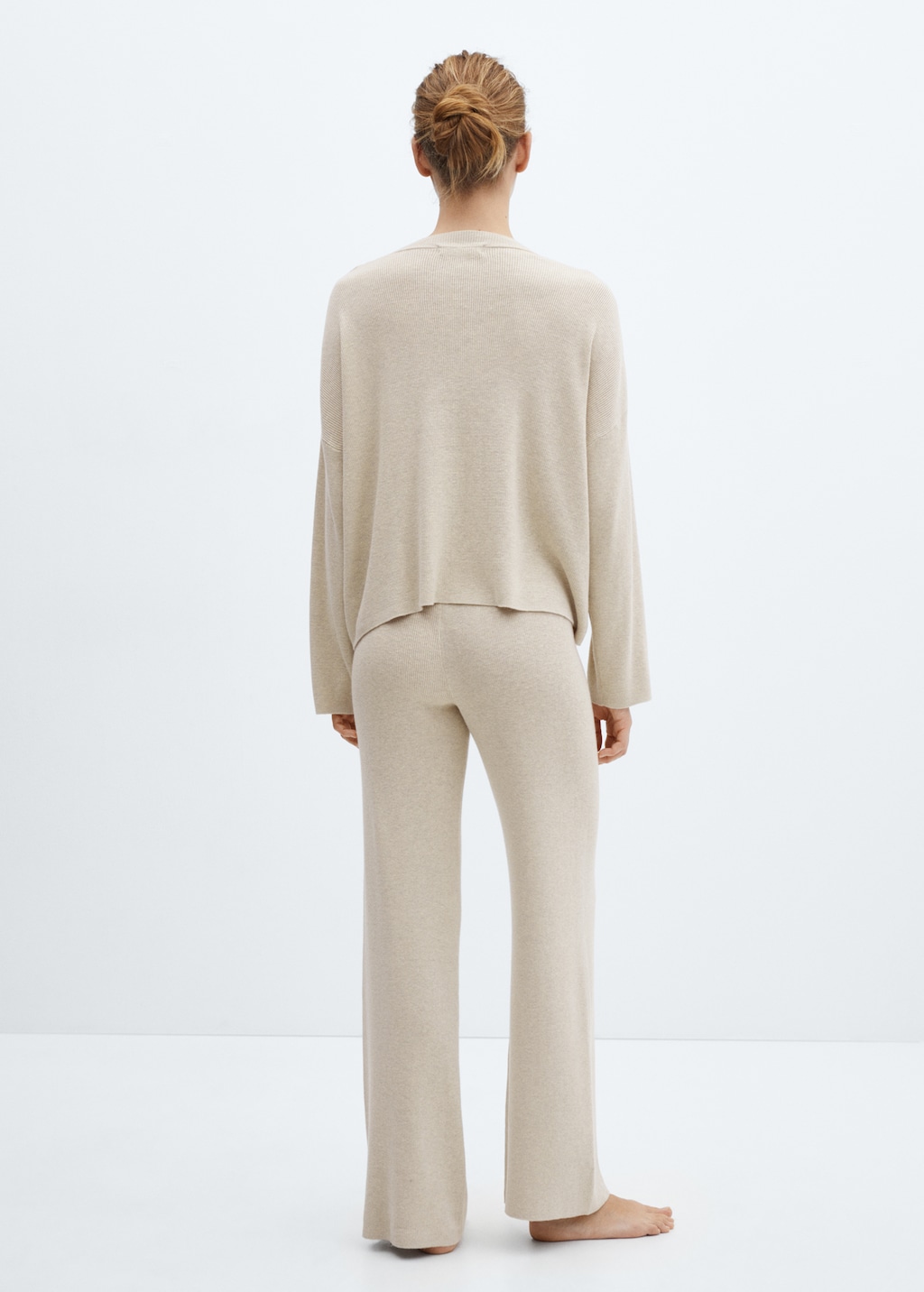 Straight knitted trousers - Reverse of the article