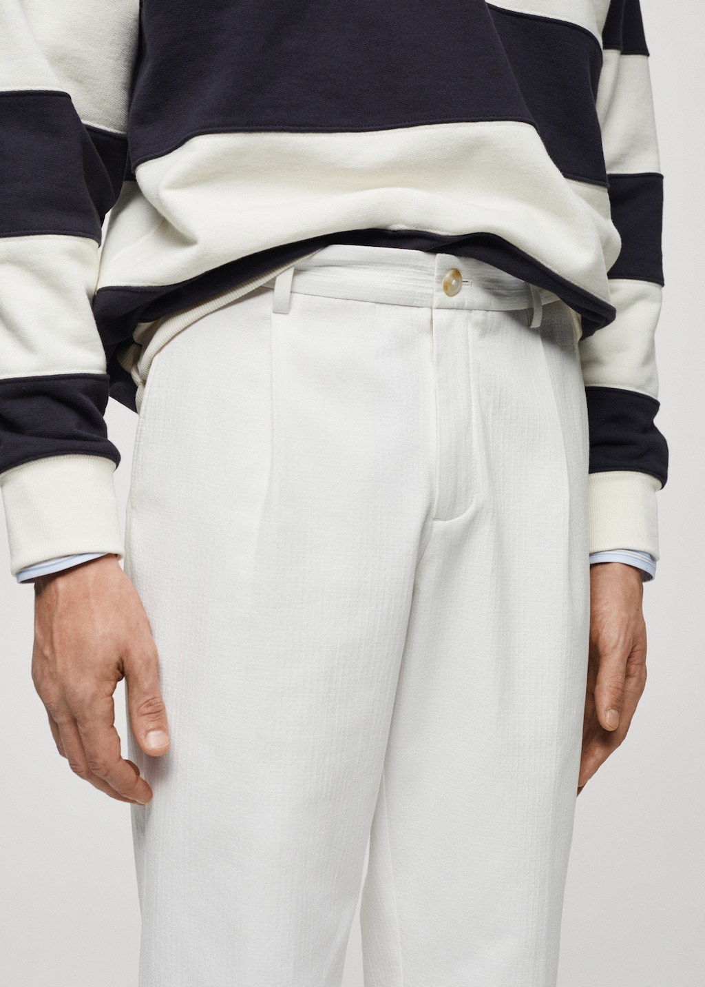 Embroidered pleated cotton trousers - Details of the article 1