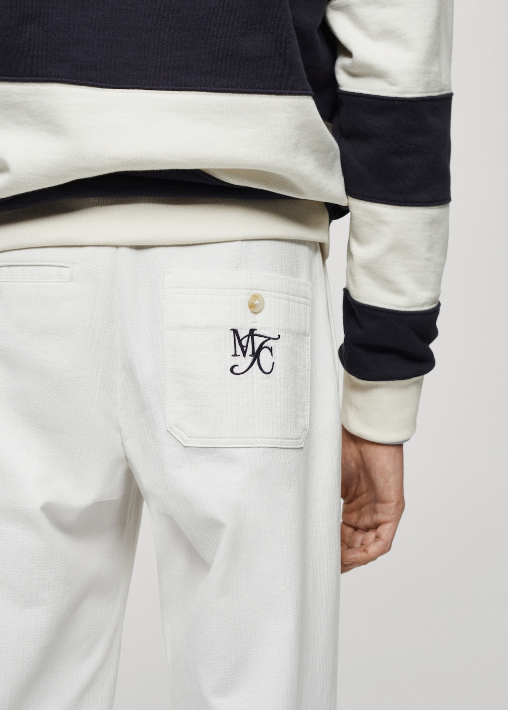 Embroidered pleated cotton trousers - Details of the article 4