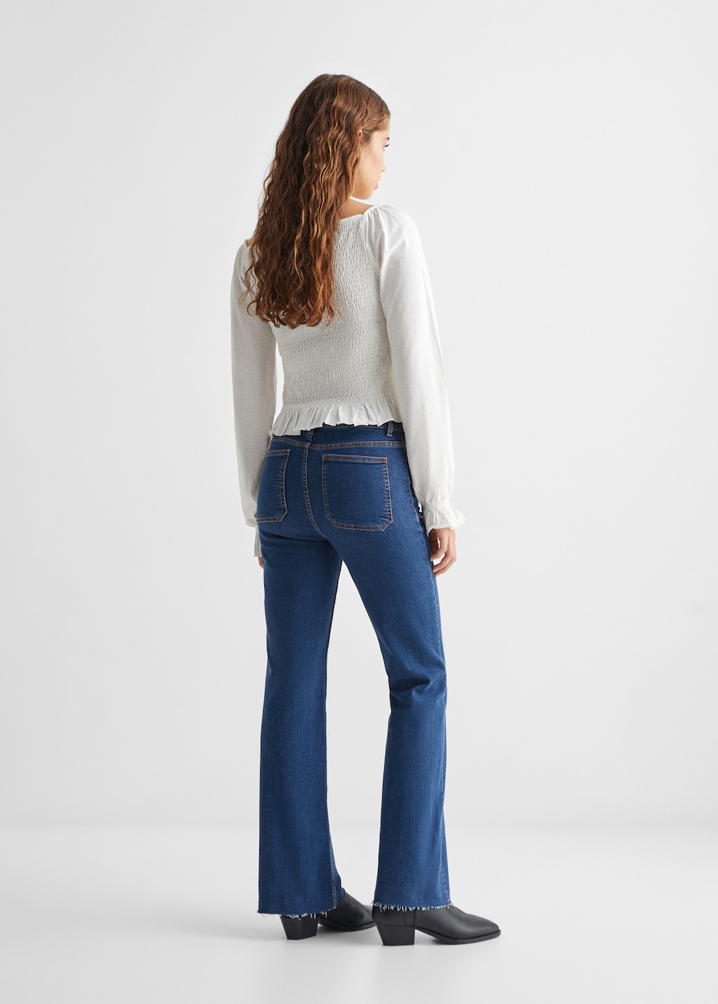 Flared jeans with pocket - Reverse of the article