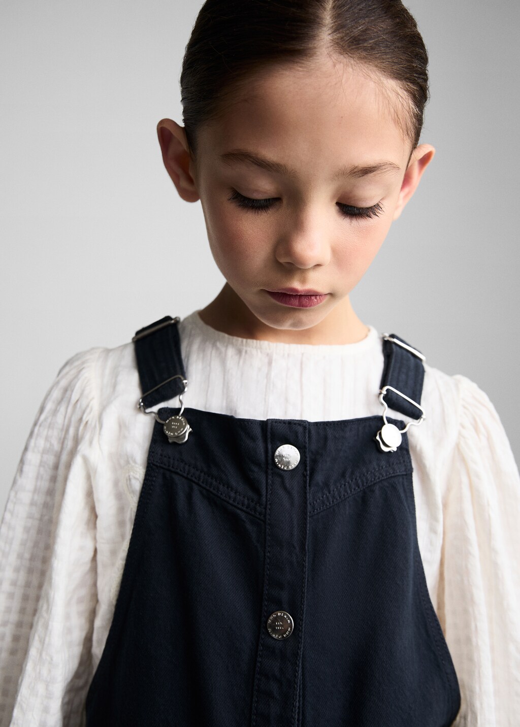 Pinafore dress with buttons - Details of the article 1