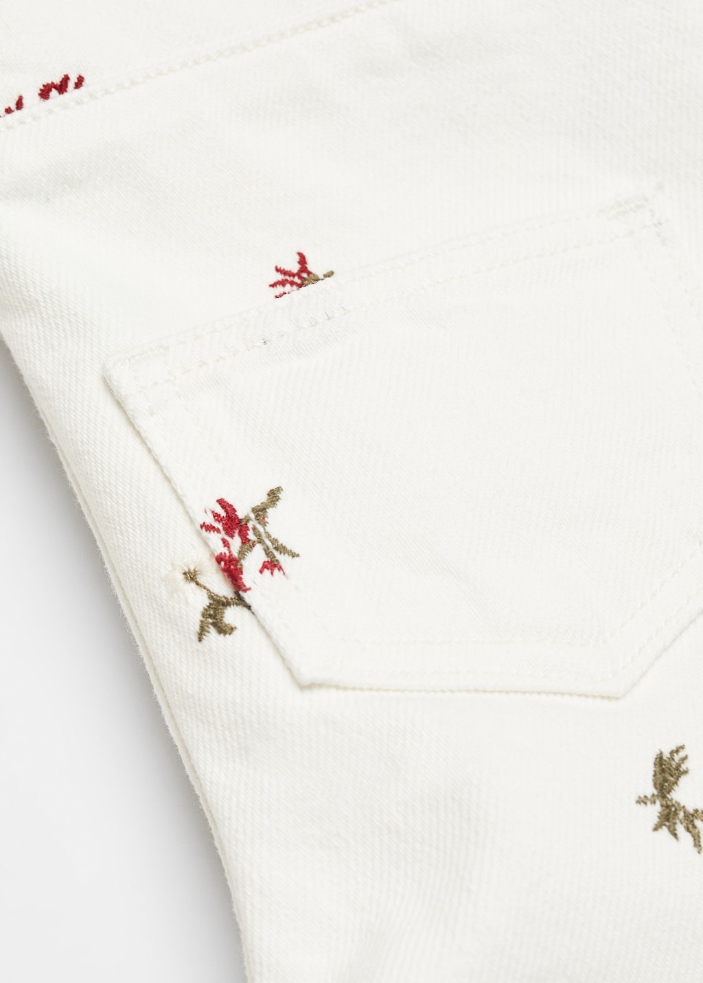 Embroidered denim dungarees - Details of the article 0