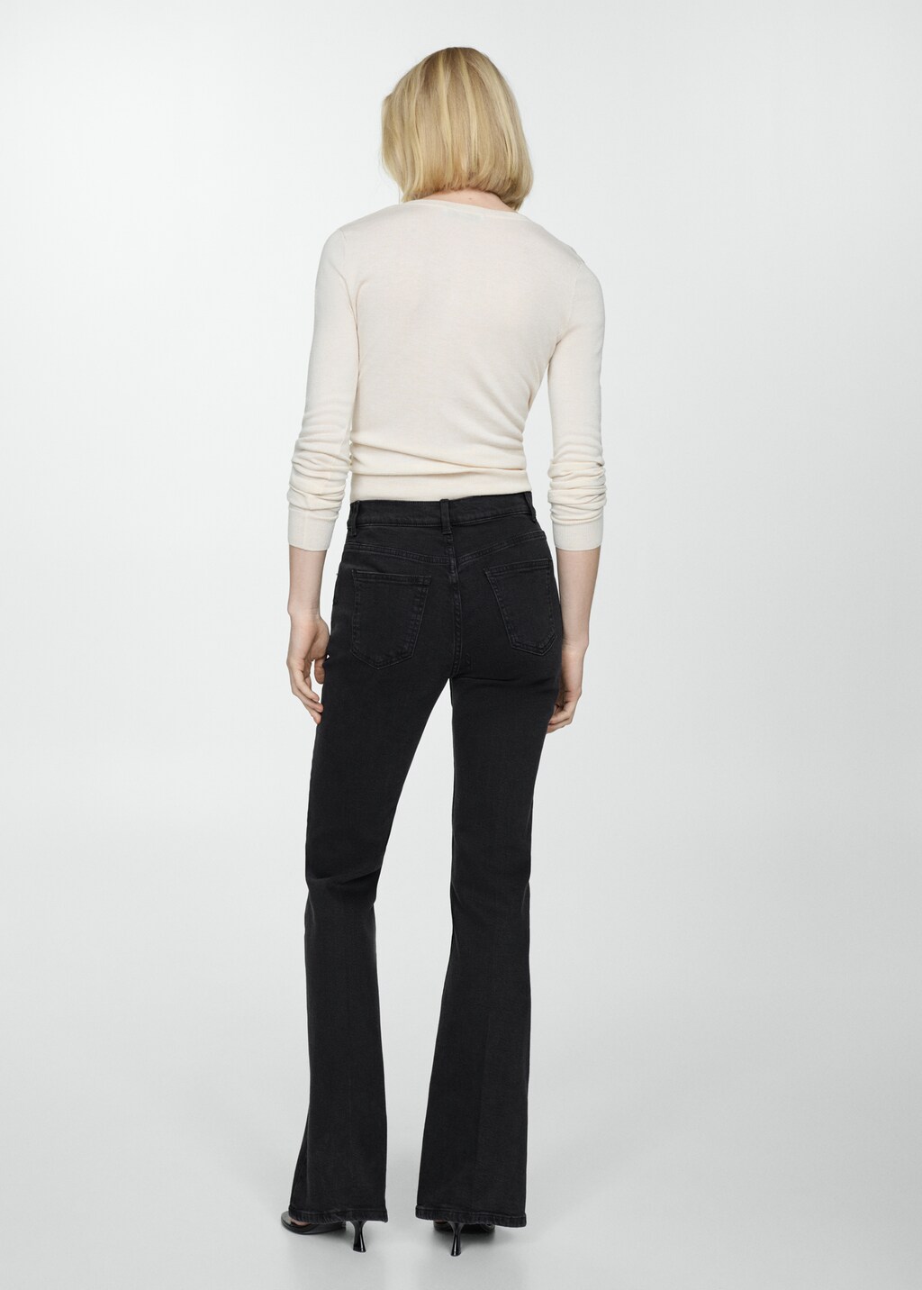 High-waist flared jeans - Reverse of the article