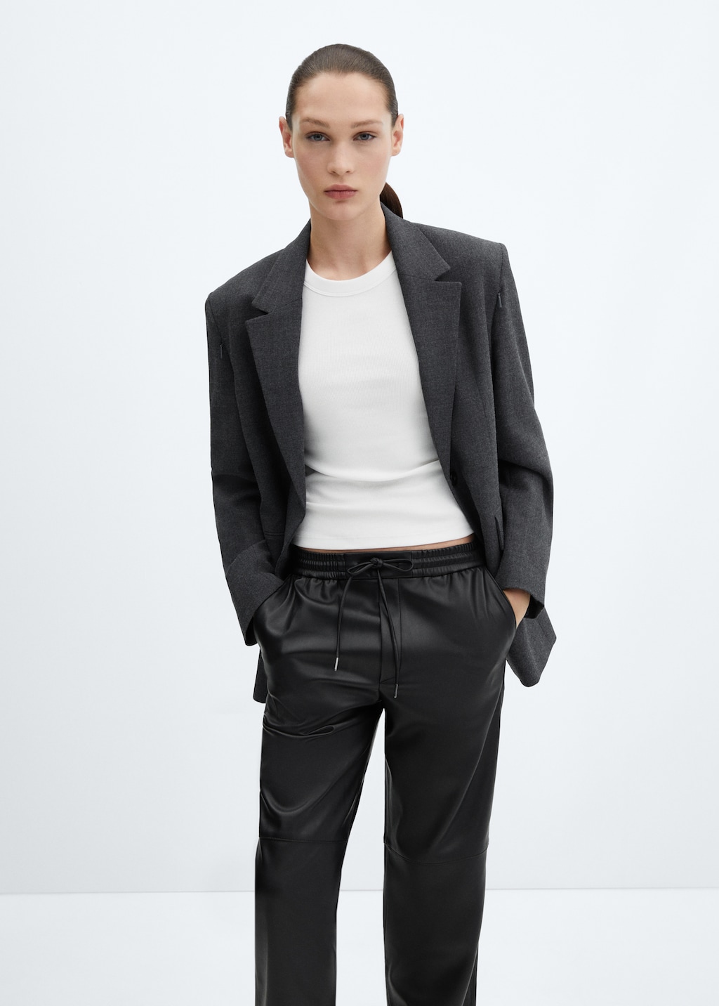 Leather-effect elastic waist trousers - Details of the article 1