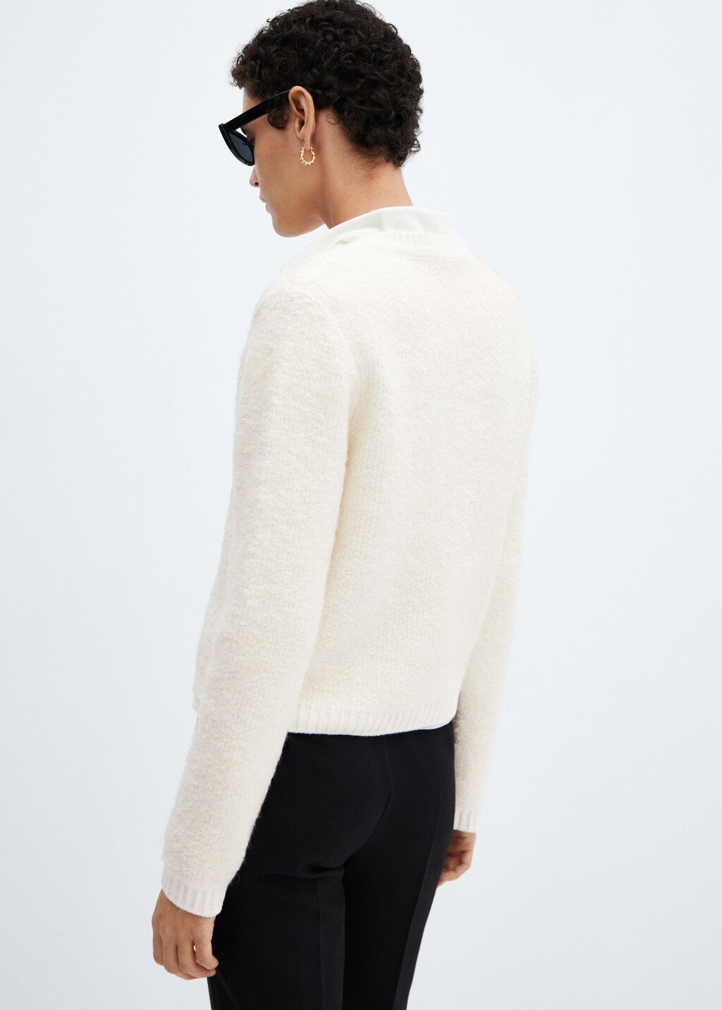 Knitted buttoned jacket - Reverse of the article