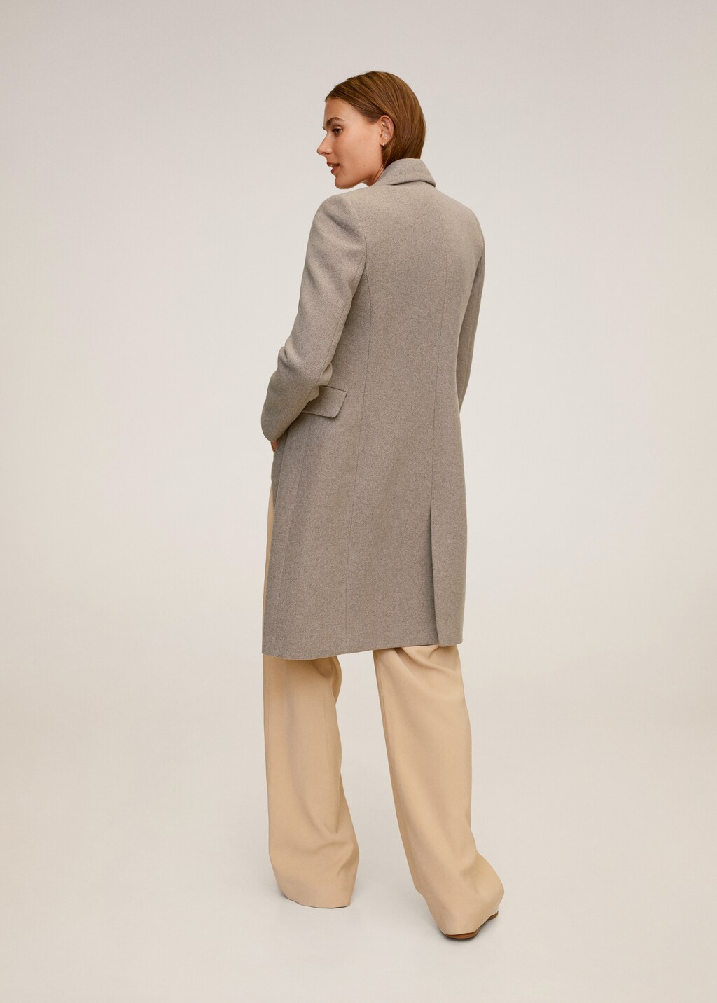 Double-breasted wool coat - Reverse of the article